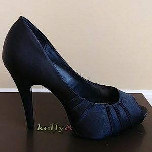 Black satin platform pumps. Kk daffodil